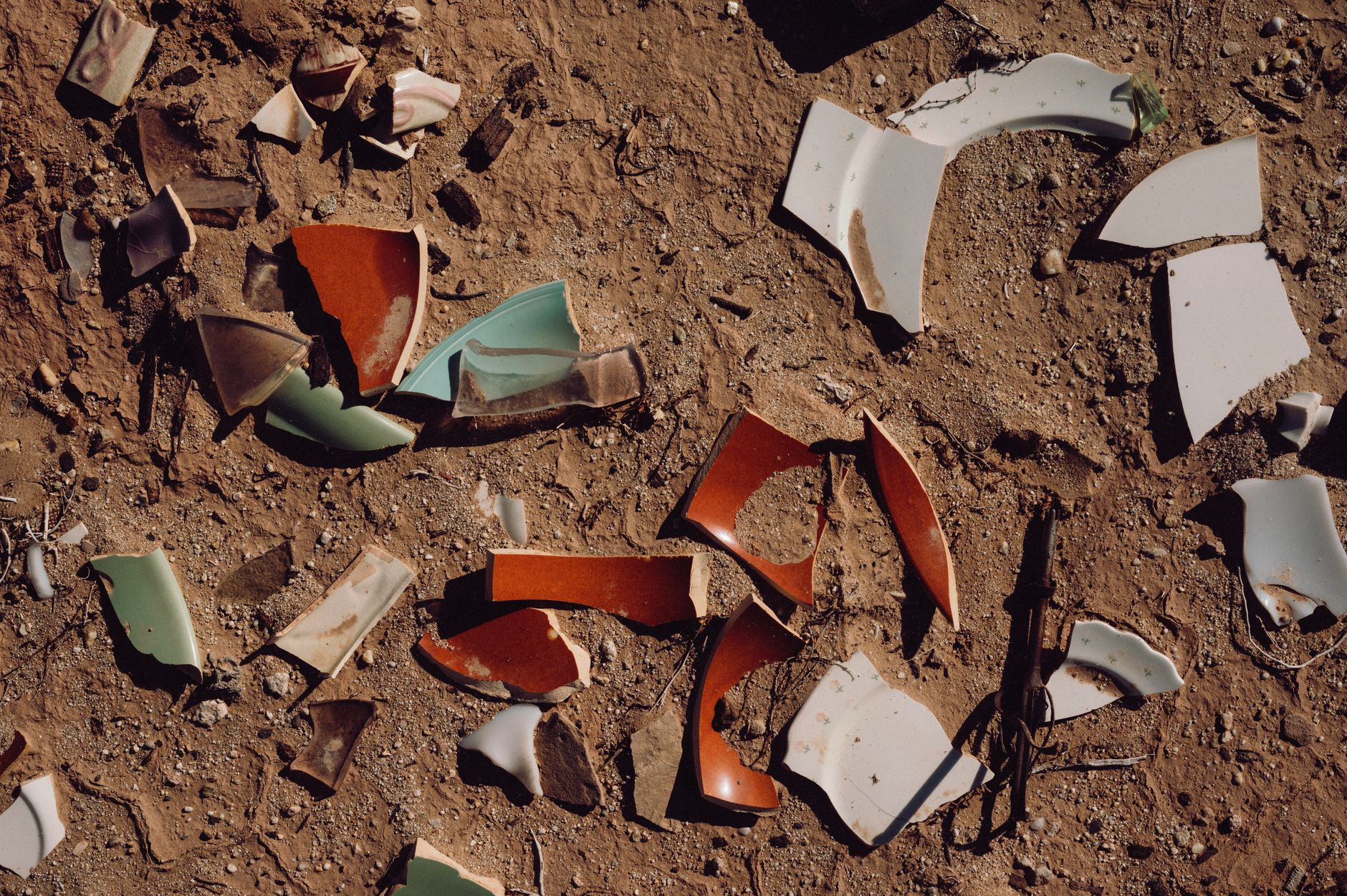 Before: construction site with scattered debris, dust accumulation, and unsorted materials